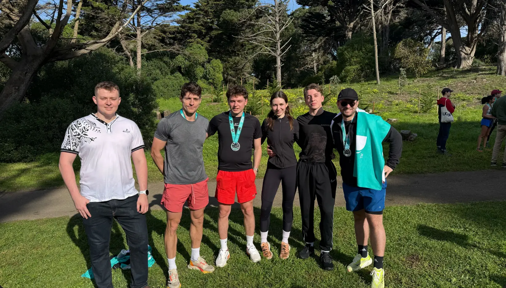 The E2B team outdoors together after a group run
